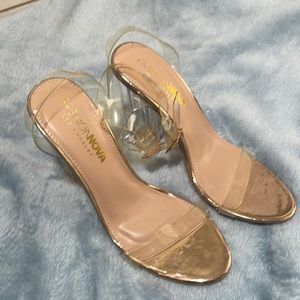 Rose gold, clear heels.